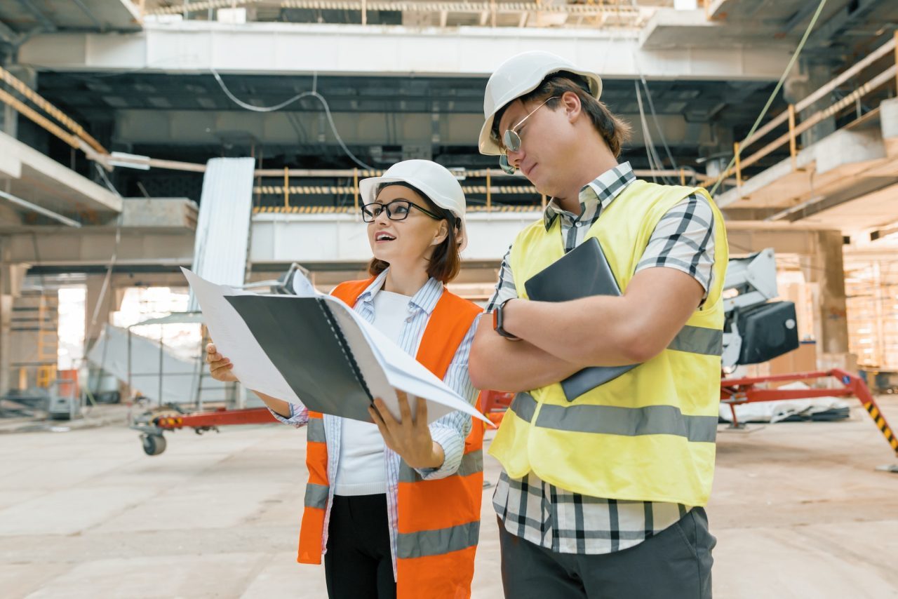 female-construction-inspector-examining-construction-site-.jpg